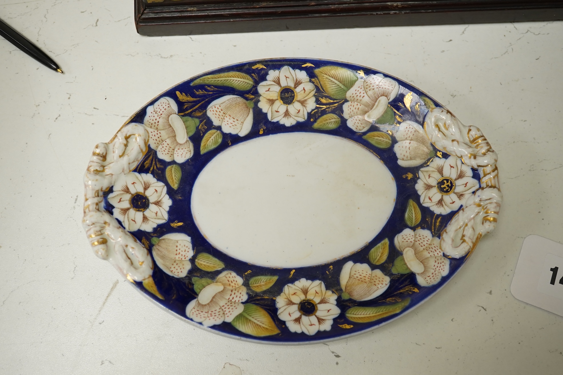 A Victorian Ironstone part set of floral decorated tableware. Condition - some items damaged